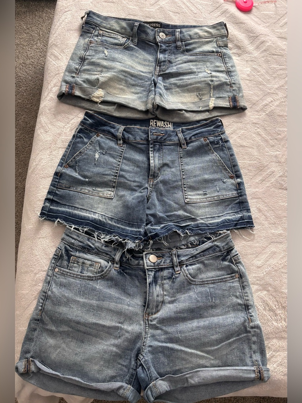 Three pairs of Blue Denim Shorts - size 4